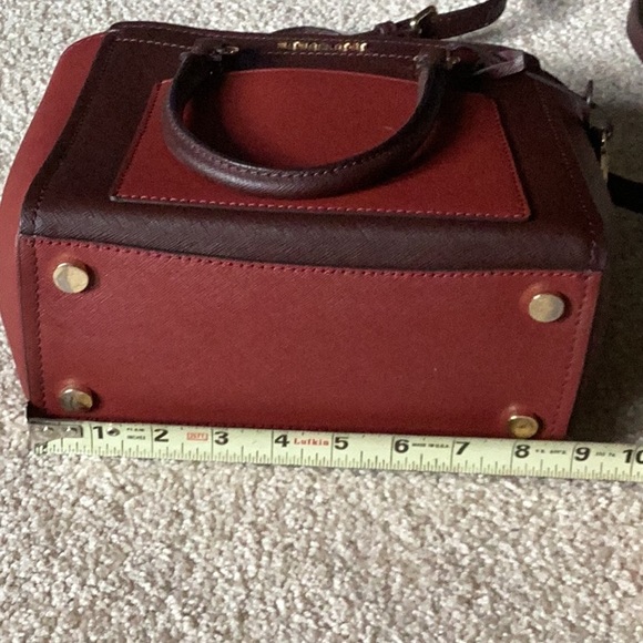 Michael Kors burgundy/brick colored handbag. - Picture 9 of 11
